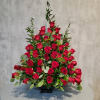 Beautiful roses adorn this series in a casket spray and pedestal arrangement