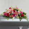 Beautiful pinks, dark pinks &amp; tropical greenery.  This spray fits a