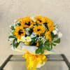 Beautiful arrangement featuring sunflowers, carnations, baby breathe, and green accents