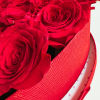 This is a next-level vibe! A heart-shaped box packed with fire-red roses&mdash;straight-up