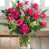 This traditional Valentine&rsquo;s flower arrangement exudes romance with a mix of vibrant