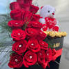 We will custom design a heart shaped centerpiece with roses and ferrero