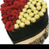 We will custom design a heart shaped centerpiece with roses and ferrero