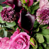 Introducing a captivating bouquet that exudes elegance and sophistication with a rich