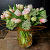 Elevate any space with this luxurious arrangement of soft pink tulips, Queen