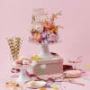 Birthday Flower Cake is made of fresh flower blooms and birthday candles