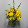 Assortment of yellow flowers will brighten any occasion and any room. 
Sure