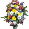 Introducing our vibrant easel spray, a stunning floral arrangement that captures the