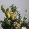 Fraser is a lush floral arrangement featuring a captivating mix of blooms