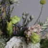 Fraser is a lush floral arrangement featuring a captivating mix of blooms