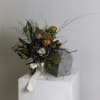 Thida is a captivating bouquet blending dried and preserved elements for a