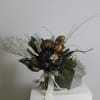 Thida is a captivating bouquet blending dried and preserved elements for a