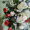This grand red white and blue standing spray is approximately 40&quot; tall