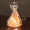 This beautiful porcelain angel figurine measures 9.5&#039;&#039; in height, and contains battery