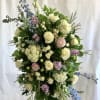 Pay tribute to a loved one with a custom-designed standing spray. ****Please