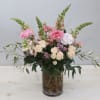 This arrangement is a promise of good things to come. The pink
