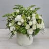 A harmony of flowers in seasonal whites and greens. Beautifully playing together