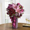 True romance! Express your love with this gorgeous flower arrangement, bursting with