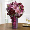 True romance! Express your love with this gorgeous flower arrangement, bursting with