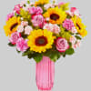 Our bright flower arrangement brings all the happiness of a sunshine-filled day.