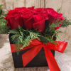 This eye-catching arrangement offers a modern twist on the classic dozen. Rustic