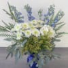 This tall blue and white arrangement is a breezy breath of summer