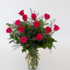 Beautiful and bright hot pink/magenta roses expertly arranged with beautiful greenery and
