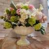 This beautiful majestic garden of roses,  lush hydrangeas, spray roses 