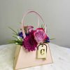 A stunning bouquet purse that embodies elegance, grace, and the celebration of