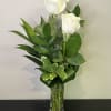 Peace and kindness shine with these beautiful white roses arranged in a