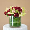 Send this elegant flower arrangement of Roses and Orchids to a loved