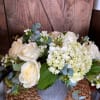 White roses, Hydrangeas, Eucalyptus, and Wax Flower Designed for a Simply Elegant