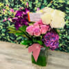 For the one who deserves it all, the Lavish Purple Rose bouquet