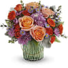 Bursting with pretty blossoms today, glowing with a votive candle later, this