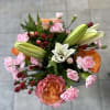 This beautiful bouquet brings together a sweet combination of colors 