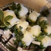 A set of matching boutonnieres and corsages for your wedding party. These
