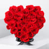 A romantic arrangement of 20-25 red roses in a classic heart-shaped box&mdash;