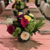 A festive blend of mixed colored, roses, hydrangeas, and mum flowers.