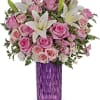 Bursting with perfect pink roses and snow white lilies, this sparkling cut