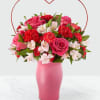 A heart halo on this vase takes the classic Valentine&#039;s bouquet up