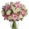 This bouquet captures the elegant contrast between the pure white roses and