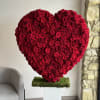 This beautiful arrangement filled with the 300-320 red roses and orchids to