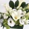 A very elegant design, featuring calla lily, white lisanthus and green hydrangea.