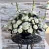 A black and white floral arrangement can be quite striking and elegant.