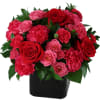 This stunning beauty combines hot pink carnations and mini carnations with showstopping