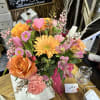 ASSORTMENT OF SOFT PINK AND PEACHE BLOOMS