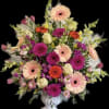 A gorgeously chic gift for any occasion, this perky gerbera bouquet is