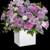 Experience the enchantment of blooms delivered! Purple roses in a eco-friendly wooden