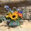 Flowers in a purse!

Purse colors options:
Natural (Brown) (Deluxe &amp; Premium Only)
Turquoise
Baby Blue