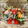 Flowers in a purse!

Purse colors options:
Natural (Brown) (Deluxe &amp; Premium Only)
Turquoise
Baby Blue